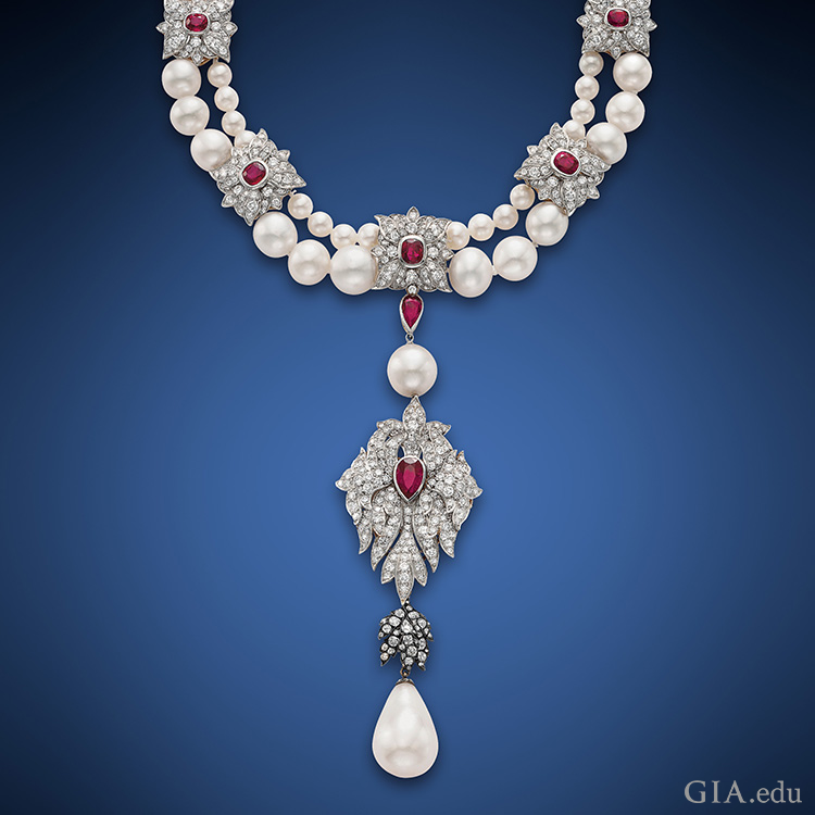 Cartier set Elizabeth Taylor’s historic 50.56 ct La Peregrina pearl as part of the pendant to this two-strand pearl, ruby and diamond necklace. Courtesy: Christie's
