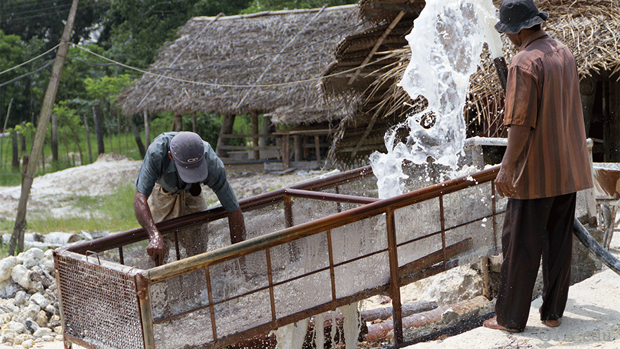 Miners in Sri Lanka are using water to sift through rocks to find moonstone, the June birthstone.