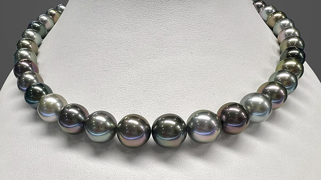 Figure 3. Necklace featuring multicolored Tahitian bead cultured pearls measuring approximately 9 to 12 mm, in a combination of various colors and overtones. Photo by Artitaya Homkrajae; courtesy of Eliko Pearl Company.