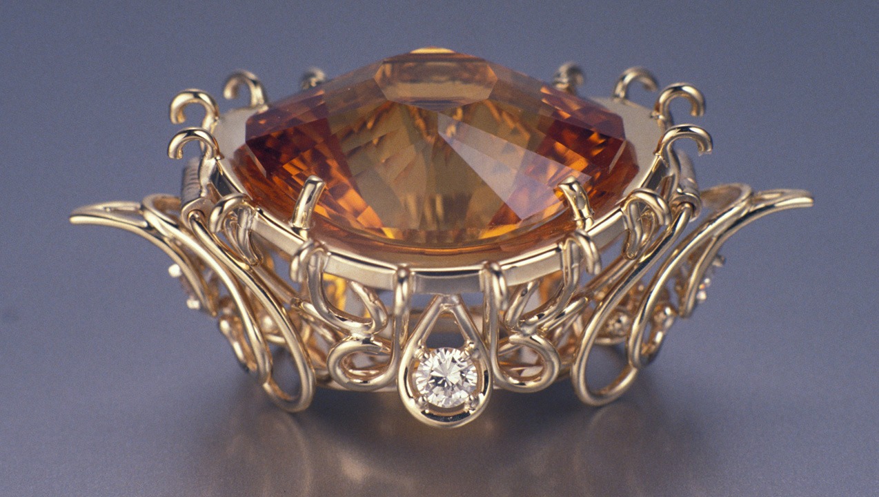 Citrine is available in large sizes. Jewelry designers love it for creating bold, impressive designs like this 29-carat gem set with diamonds into a versatile clasp/pendant. - Robert Weldon, courtesy C. Y. Sheng Citrine is available in large sizes. Jewelry designers love it for creating bold, impressive designs like this 29-carat gem set with diamonds into a versatile clasp/pendant. - Robert Weldon, courtesy C. Y. Sheng