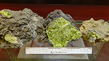 Vietnamese peridot nodules, rough stones, and faceted samples Vietnamese peridot nodules, rough stones, and faceted samples