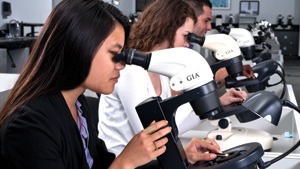 Students Looking Through Microscopes