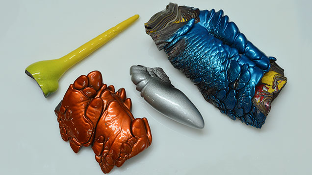 Three Fordite slag specimens