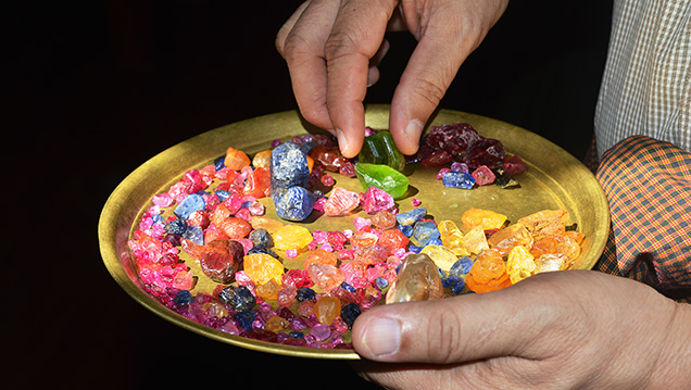Gem miner with Burmese gems from Mogok