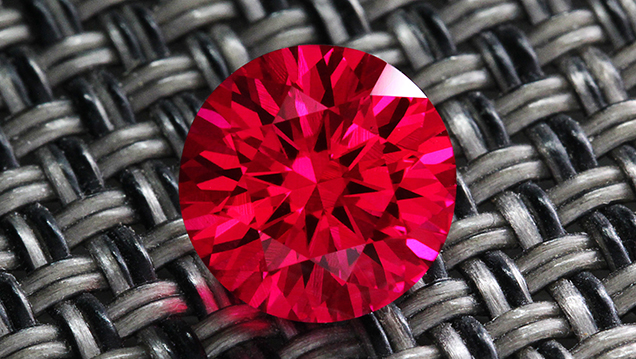 The Geometeer, a synthetic ruby with a hybrid cut by Rex Guo.