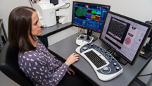 Karen Smit uses a Scanning Electron Microscope to view images of a sample's topography or composition and the internal growth structure of diamond. The screen to her left shows compositional maps of a sulphide still included in a diamond. Six different color images map the distribution of a certain element across an area of interest. The screen on her right shows the features on the surface of a pearl. 