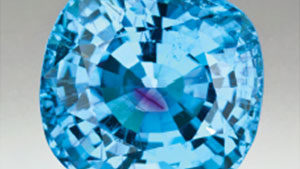 {Solution-Generated Pink Color Surrounding Growth Tubes and Cracks in Blue to Blue-Green Copper-Bearing Tourmalines from Mozambique  John I. Koivula, Kevin Nagle, Andy Hsi-Tien Shen, and Philip Owens , Apr 6, 2009} - image