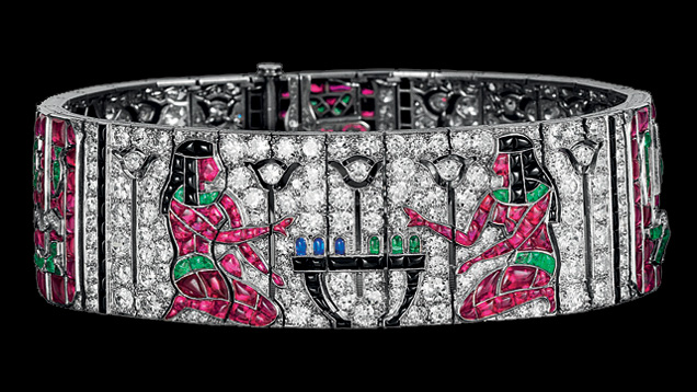 This multi-colored Van Cleef & Arpels bracelet from 1924 is decorated with ancient Egyptian hieroglyphic motifs. It features buff-top emeralds, sapphires, rubies, pavé-set diamonds, and calibrated onyx. Most of the house’s Egyptian revival jewels, which were at the height of fashion in the 1920s, are clips or bracelets created between 1922 and 1925. Photo courtesy of Van Cleef & Arpels.