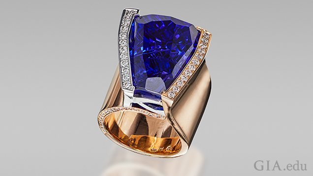 Blue freeform tanzanite in ring.