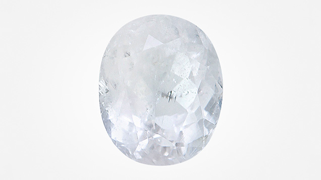 Figure 1. A 4.86 ct near-colorless faceted viitaniemiite. Photo by Lhapsin Nillapat.