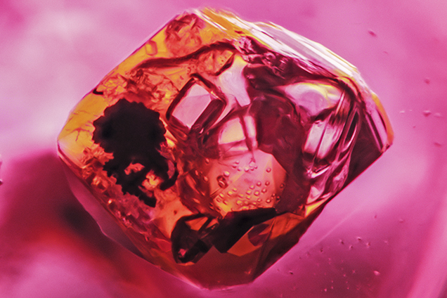 Negative crystal in Burmese red spinel.
