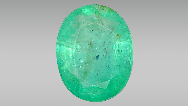7.11 ct emerald with a large purple inclusion