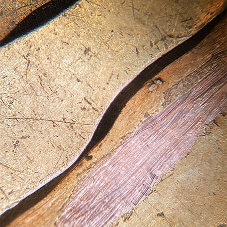 Figure 1. In this gold-plated rose gold item submitted as 14K, the rose gold base tested 9K and the yellow gold layer tested 13.5K. Photo by Carlos Bautista.