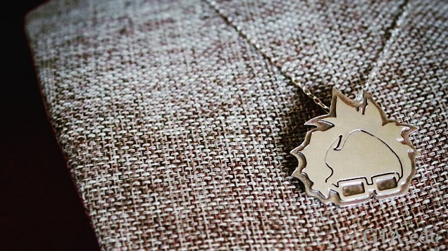 Bernie Sanders' hair and glasses as a pendant to hang from a necklace.