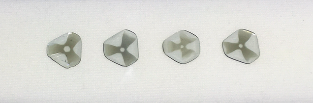 SU15-GNI-fig33_185363-636x210. Diamond slices showing a “trapiche” pattern.