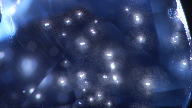 Spherical clouds surrounding highly altered crystals Spherical clouds surrounding highly altered crystals