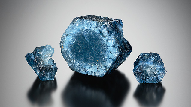 Heavily etched blue beryl crystals.