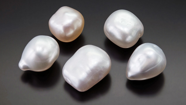 Five atypical “box bead” cultured pearls. Five atypical “box bead” cultured pearls.