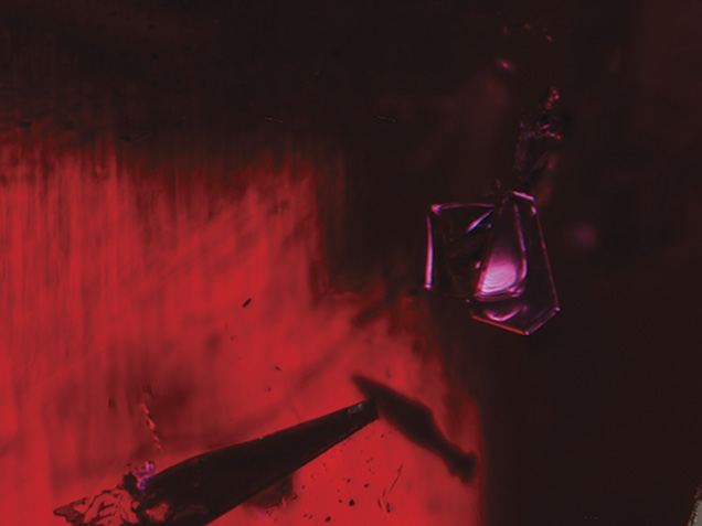 Synthetic ruby under fiber-optic lighting