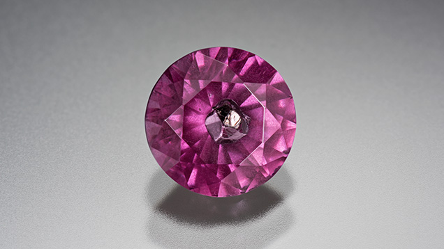 Pyrope garnet with metal sulfide inclusion