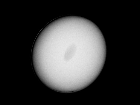 RTX imaging reveals an ovalish void-like feature surrounded by a growth ring.