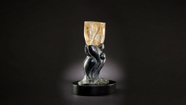 This rutilated smoky quartz sculpture – virtually free of feathers or flaws with very even dispersion of rutile needles – is from Rio Grande do Sul, Brazil.