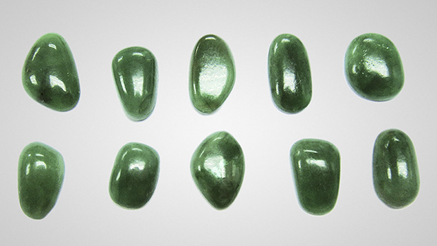 In recent years, the coating of low-quality jadeite has reemerged in the Chinese markets. These coated jadeites (1.43– 2.71 ct) were examined in the study. Photo by Jian Zhang. In recent years, the coating of low-quality jadeite has reemerged in the Chinese markets. These coated jadeites (1.43– 2.71 ct) were examined in the study. Photo by Jian Zhang.