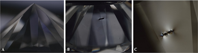 AOTC HPHT synthetic diamond photomicrographs displaying weak low-order interference colors AOTC HPHT synthetic diamond photomicrographs displaying weak low-order interference colors