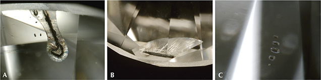 AOTC HPHT synthetic diamond photomicrographs showing inclusions, feathers, or fractures AOTC HPHT synthetic diamond photomicrographs showing inclusions, feathers, or fractures