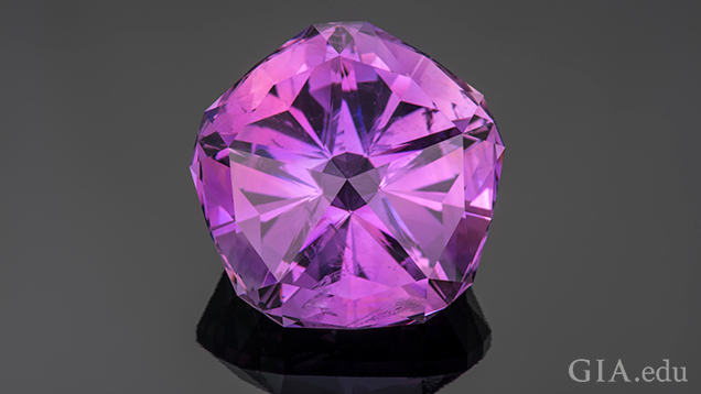 A faceted purple gem. A faceted purple gem.
