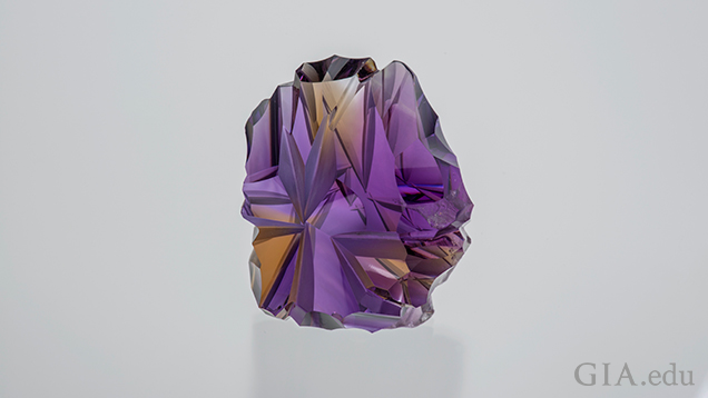 A carved piece of ametrine. A carved piece of ametrine.