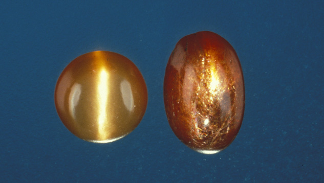 The 2.39-ct. aventurescent sunstone (right) is from the state of Tamil Nadu, in southern India. It’s accompanied by a cat’s-eye moonstone from the same area (left). – Shane F. McClure The 2.39-ct. aventurescent sunstone (right) is from the state of Tamil Nadu, in southern India. It’s accompanied by a cat’s-eye moonstone from the same area (left). – Shane F. McClure