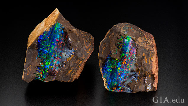 Blue, green and red flashes of color stand out in this pair of boulder opal specimens in matrix. Blue, green and red flashes of color stand out in this pair of boulder opal specimens in matrix.