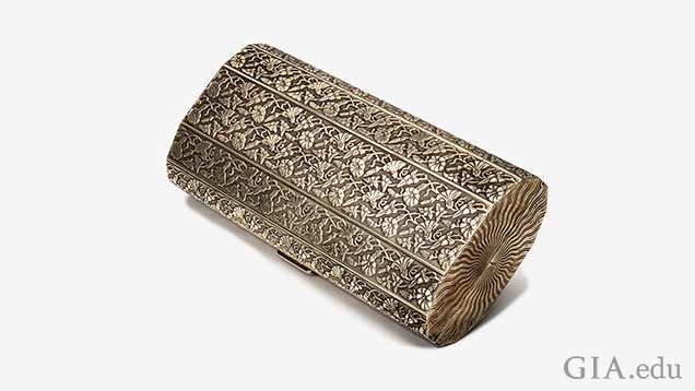 Silver fold-over clutch.