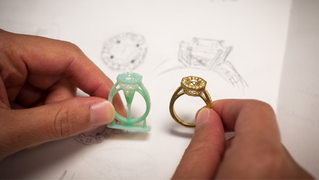 Jewelry Design technology students compare the visual communications of their designs to the 3-D-printed and cast prototypes. Photo by Kevin Schumacher Jewelry Design technology students compare the visual communications of their designs to the 3-D-printed and cast prototypes. Photo by Kevin Schumacher