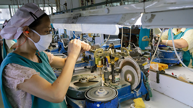 Worker faceting stones Worker faceting stones