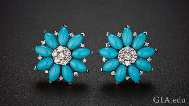 Two flower earrings feature Sleeping Beauty turquoise petals with diamond centers.