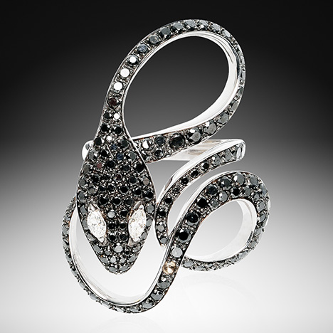 Snake ring with black and colorless diamonds Snake ring with black and colorless diamonds