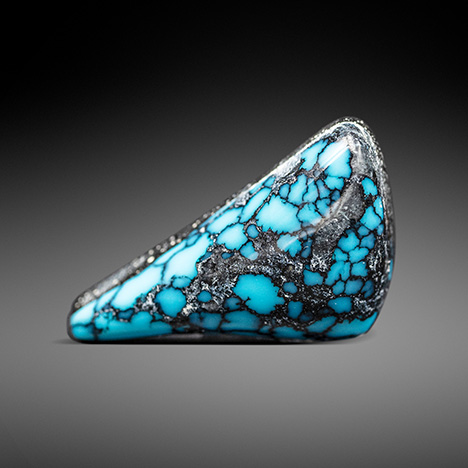 A 9.32 ct backed turquoise from China.