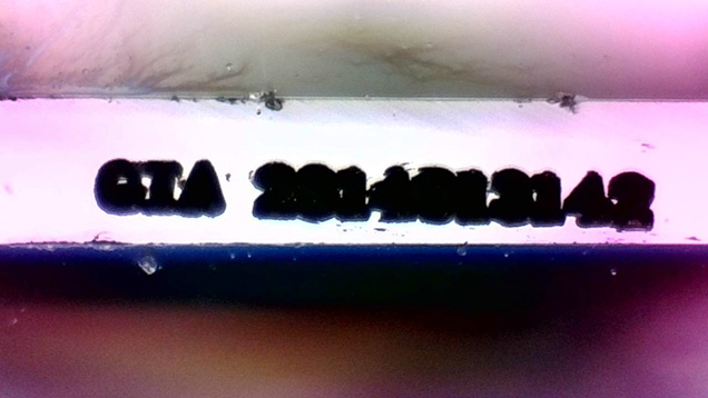 Fraudulent inscription identified on a synthetic moissanite. Fraudulent inscription identified on a synthetic moissanite.