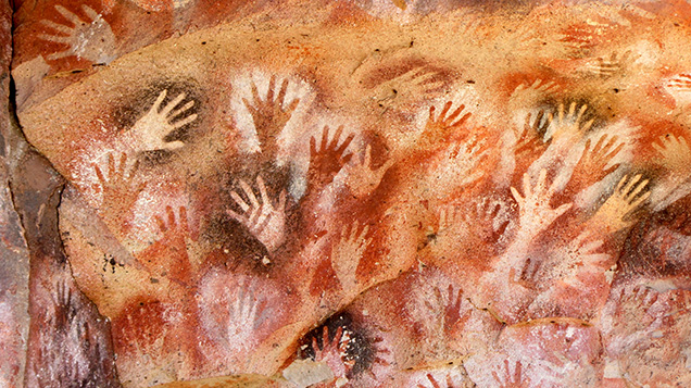 Hands stenciled using red ochre at the entrance of Cueva de las Manos. Hands stenciled using red ochre at the entrance of Cueva de las Manos.