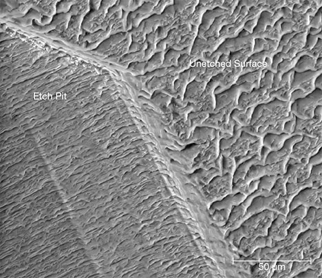 SEM image of an iridescent z face in quartz SEM image of an iridescent z face in quartz