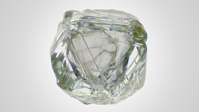 Small hexagonal diamond crystal enclosed in the cavity.