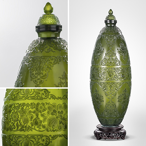 Eggshell-thin dark green nephrite vase is decorated with lotus branches. Eggshell-thin dark green nephrite vase is decorated with lotus branches.
