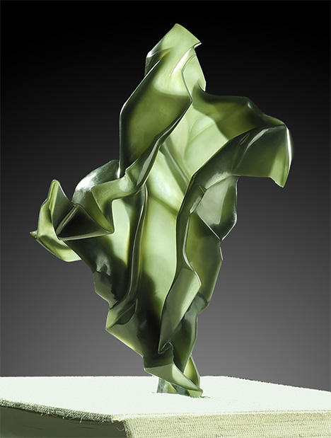 Eggshell carving showcases the transparent feel of creased paper in this nephrite work of art. Eggshell carving showcases the transparent feel of creased paper in this nephrite work of art.