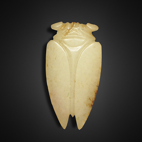 Concisely carved jade cicada typical of the Han Badao craft. Concisely carved jade cicada typical of the Han Badao craft.