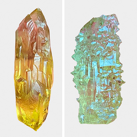 Figure A-2. Yellow and greenish yellow beryl crystals from the Volodarsk mining area in Ukraine showing heavily dissolved surface patterns due to natural etching and dissolution subsequent to the crystal growth process. Crystal length: 61 mm (left) and 43 mm (right). Photos by Peter Lyckberg. Figure A-2. Yellow and greenish yellow beryl crystals from the Volodarsk mining area in Ukraine showing heavily dissolved surface patterns due to natural etching and dissolution subsequent to the crystal growth process. Crystal length: 61 mm (left) and 43 mm (right). Photos by Peter Lyckberg.