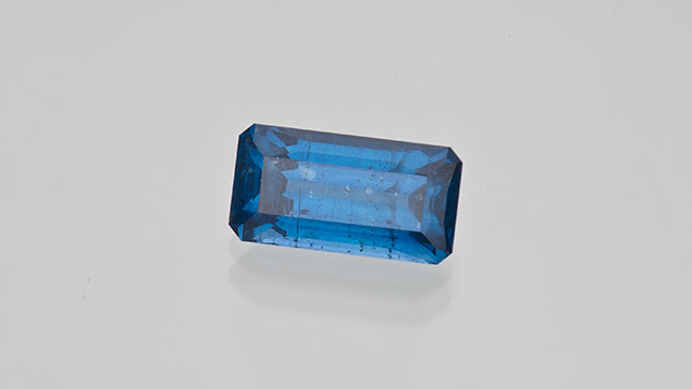 Figure 4. A 4.44 ct gem-quality kyanite from Kenya. Photo by Robert Weldon; courtesy of the Dr. Edward J. Gübelin Collection. Figure 4. A 4.44 ct gem-quality kyanite from Kenya. Photo by Robert Weldon; courtesy of the Dr. Edward J. Gübelin Collection.