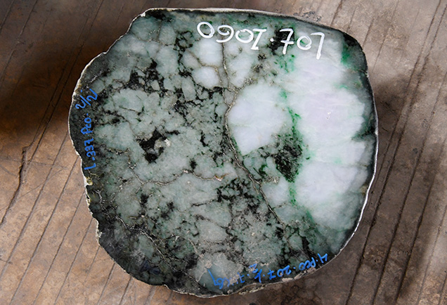 Figure 8. Rough jade boulder displaying a complex pattern not typically seen in finished gems. Photo by Wim Vertriest. Figure 8. Rough jade boulder displaying a complex pattern not typically seen in finished gems. Photo by Wim Vertriest.