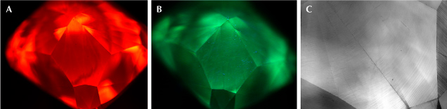 Three images of a crystal: A shows it in red light, B in green light, and C in grayscale, highlighting different visual properties. Three images of a crystal: A shows it in red light, B in green light, and C in grayscale, highlighting different visual properties.